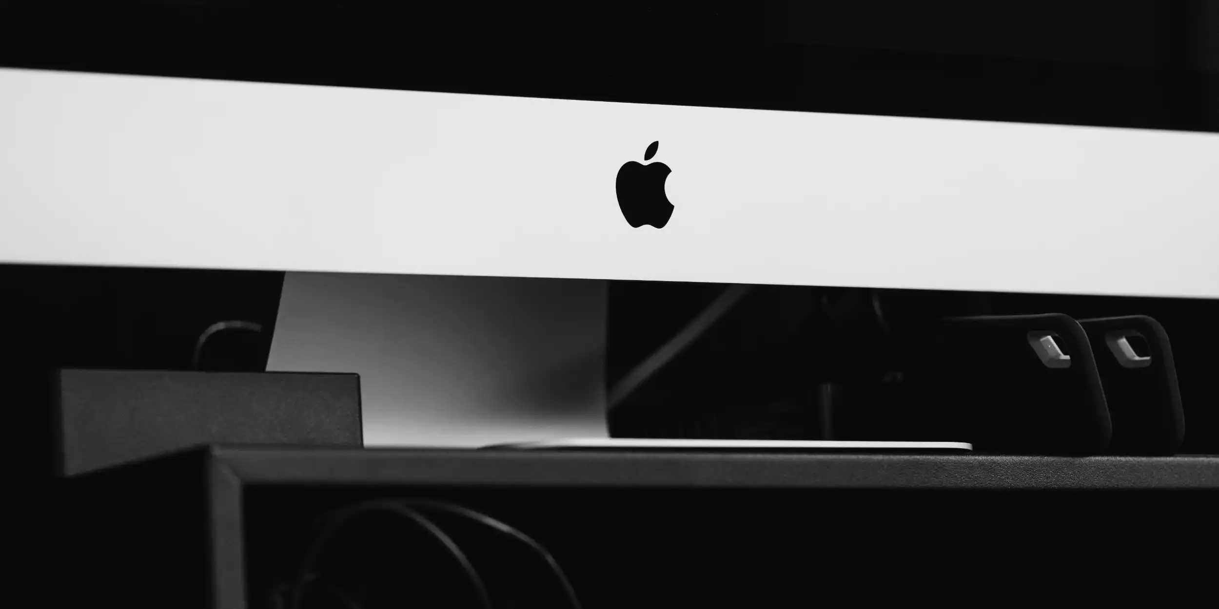 Bottom frame of Apple monitor with logo.